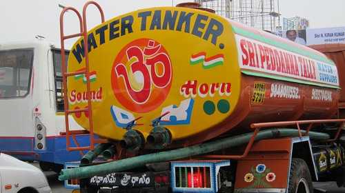 lorry with sign saying sound horn